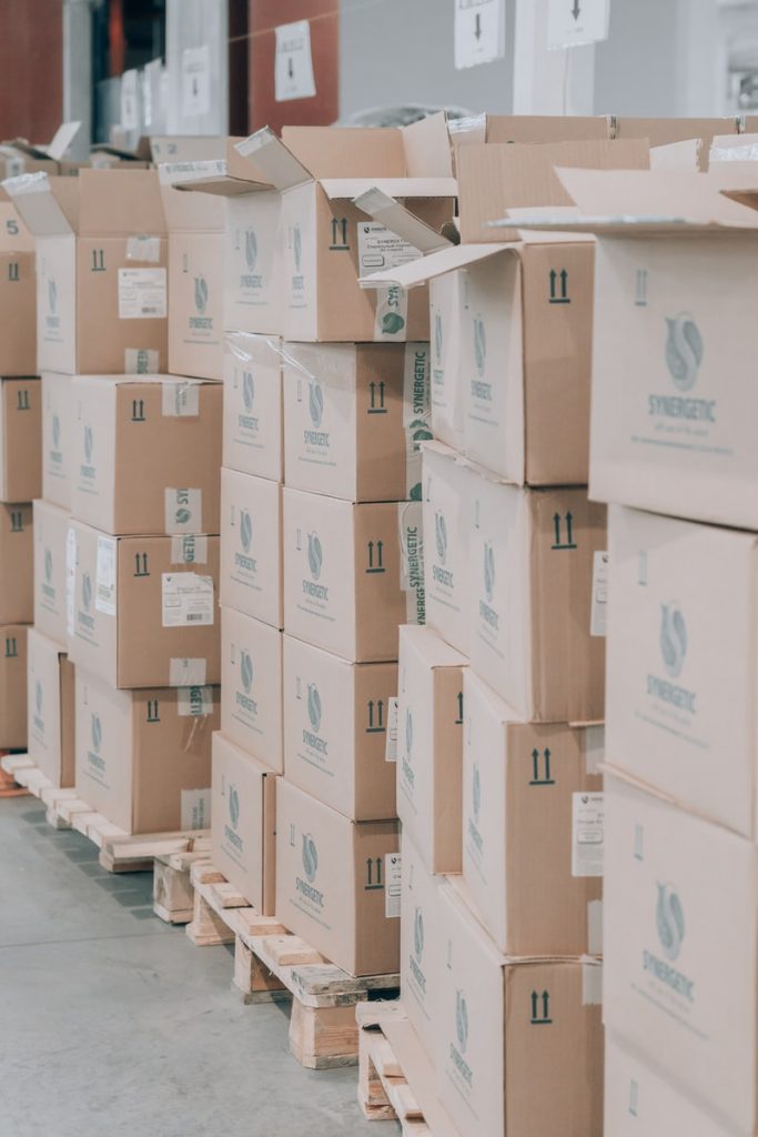 brown cardboard boxes on white floor